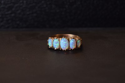 Lot 15 - 9ct gold five-stone opal ring
