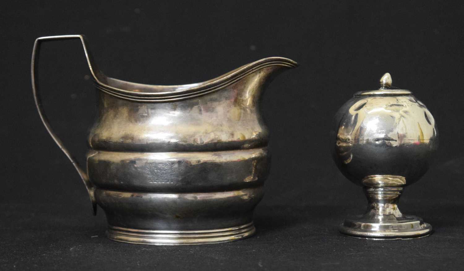 Lot 145 - Georgian silver cream jug and muffner