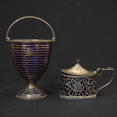 Lot 139 - George V silver basket with swing handle and a silver mustard pot