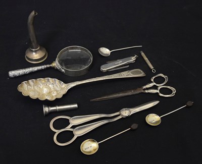 Lot 125 - Quantity of silver to include George V silver grape scissors, 'berry spoon', etc