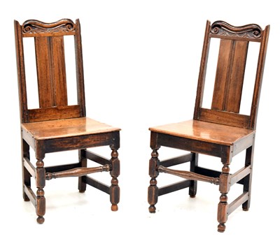 Lot 427 - Pair of 18th century oak hall chairs