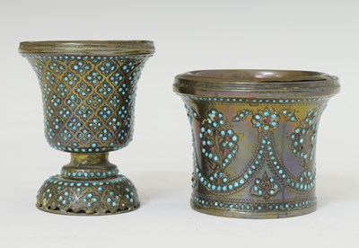 Lot 587 - Two 19th century Persian Qajar turquoise-mounted brass ghalian cups