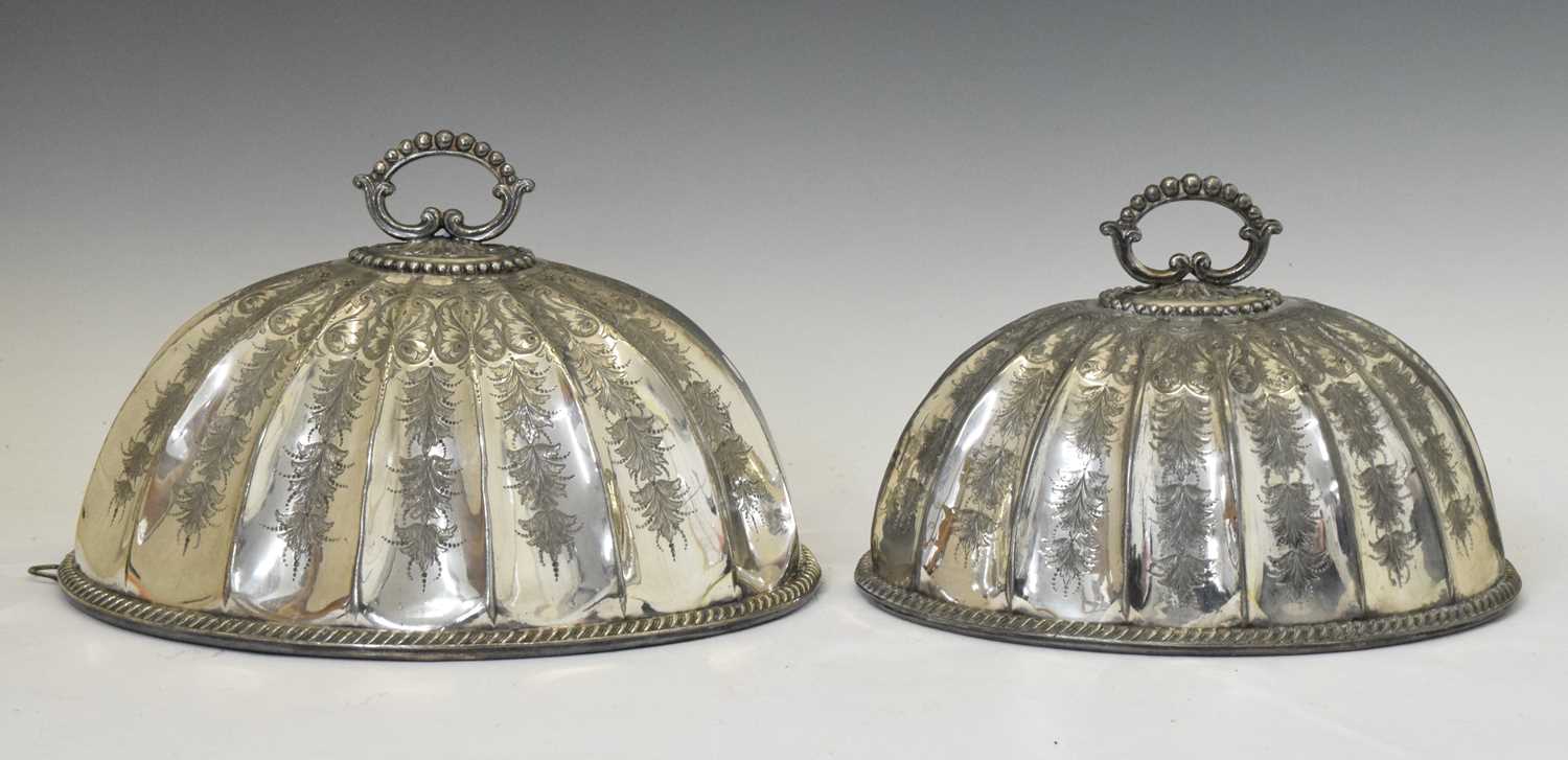 Lot 351 - Two 19th century silver plated meat covers