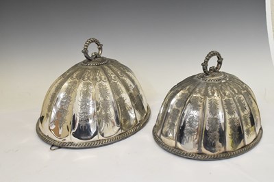 Lot 351 - Two 19th century silver plated meat covers