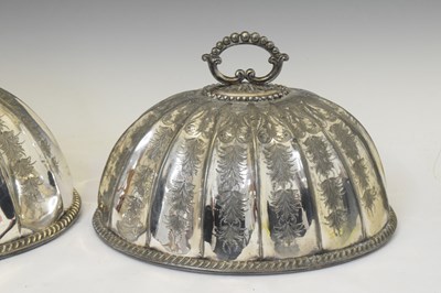 Lot 351 - Two 19th century silver plated meat covers