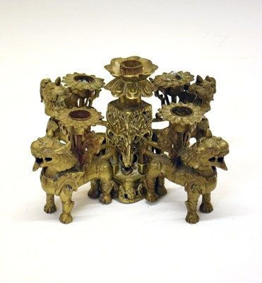 Lot 311 - Tibetan cast brass table candelabrum