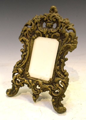 Lot 198 - Miniature cast brass frame with rococo decoration