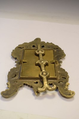 Lot 198 - Miniature cast brass frame with rococo decoration