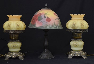 Lot 221 - Pair of electric gilt metal and yellow glass table lamps and one other