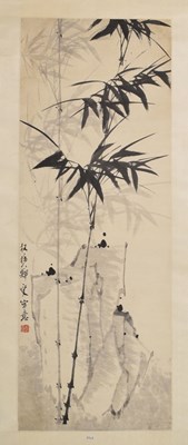 Lot 464 - Chinese watercolour scroll painting depicting bamboo with landscape behind