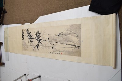 Lot 464 - Chinese watercolour scroll painting depicting bamboo with landscape behind