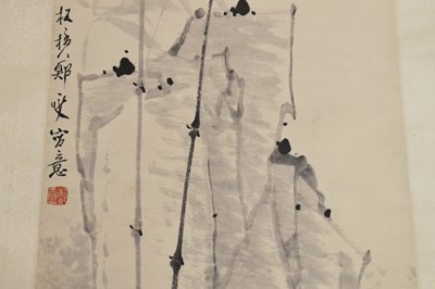 Lot 464 - Chinese watercolour scroll painting depicting bamboo with landscape behind
