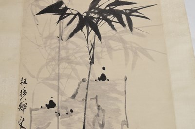 Lot 464 - Chinese watercolour scroll painting depicting bamboo with landscape behind