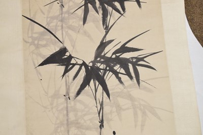 Lot 464 - Chinese watercolour scroll painting depicting bamboo with landscape behind