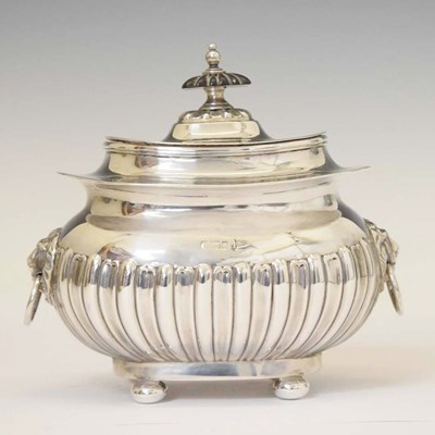 Lot 138 - Edward VII silver tea caddy with gadroon decoration and a pair of lion head handles