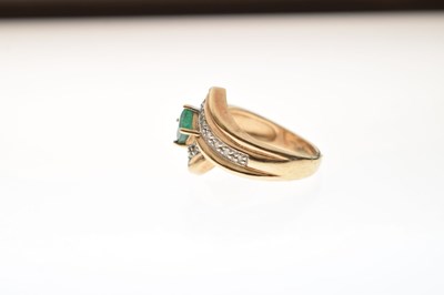 Lot 12 - 9ct gold dress ring set single square cut emerald