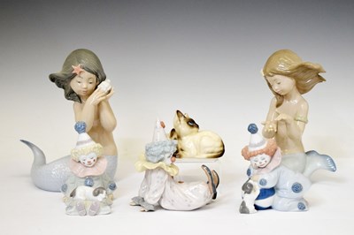 Lot 292 - Lladro - Three porcelain Pierrot clowns and others