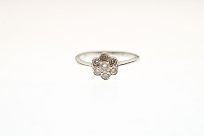 Lot 17 - 18ct white gold diamond daisy cluster ring