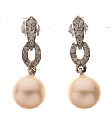 Lot 84 - Pair of 9ct white gold, diamond and pearl drop earrings