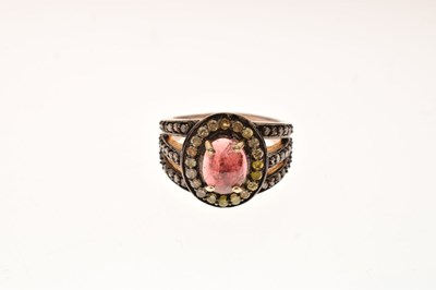 Lot 35 - Pink tourmaline and diamond dress ring