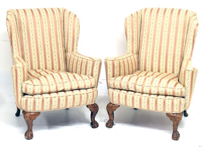 Lot 432 - Pair of early 20th century George II-style wing armchairs