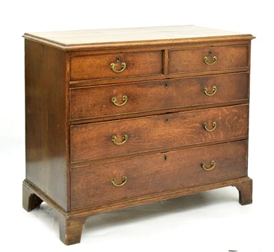 Lot 416 - George III oak chest of drawers