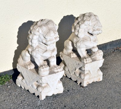 Lot 310 - Pair of composition Chinese-style Guardian Lions