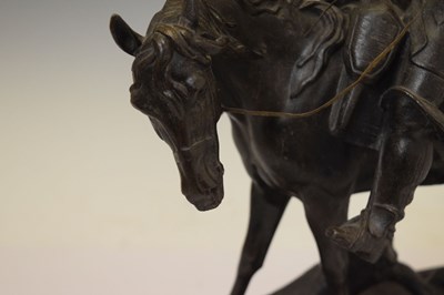 Lot 219 - Spelter figure of a cavalier on horse back