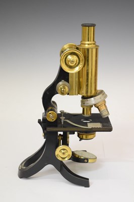 Lot 228 - Cased J. Swift & Son, London 'Army' brass and lacquered metal microscope