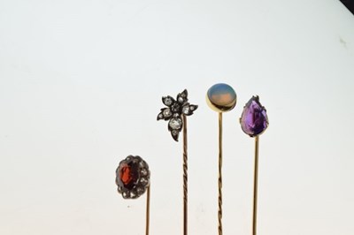 Lot 89 - Collection of four tie-pins