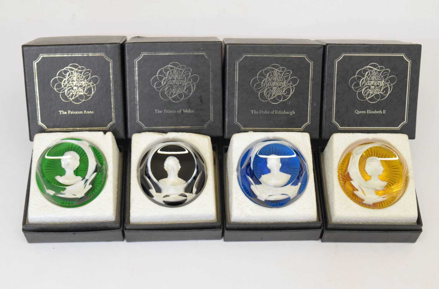 Lot 269 - Set of four Baccarat 'Royal cameos In Crystal' glass paperweights