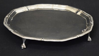 Lot 136 - George V silver salver standing on four cast feet