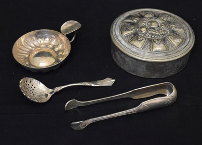 Lot 181 - White metal tongs, silverplated sugar sifter spoon, etc