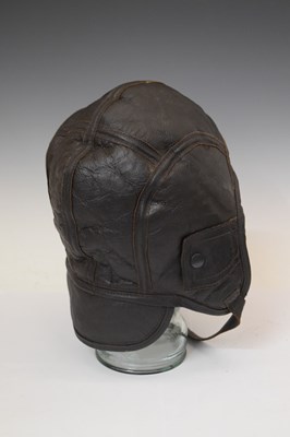 Lot 224 - Wooden motorcycle helmet and leather caps