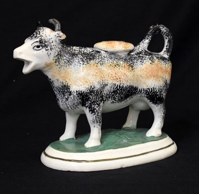 Lot 299 - Spongeware cow creamer