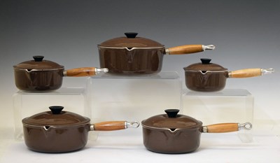 Lot 544 - Le Creuset - Graduated set of five brown enamel saucepans