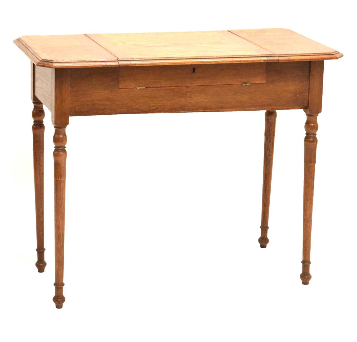 Lot 504 - Early 20th century Britisher oak metamorphic writing table/desk