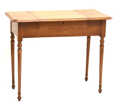 Lot 504 - Early 20th century Britisher oak metamorphic writing table/desk