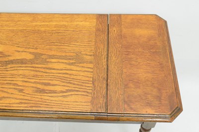 Lot 504 - Early 20th century Britisher oak metamorphic writing table/desk