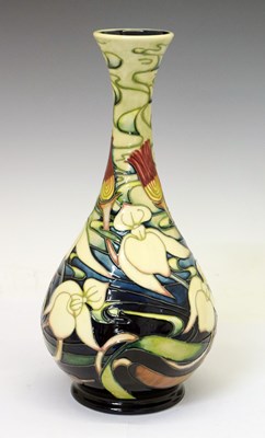 Lot 313 - Moorcroft Pottery - Orchid Arabesque pattern vase