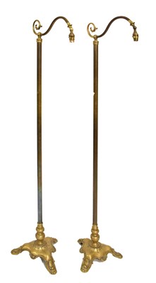 Lot 581 - Pair of brass standard lamps