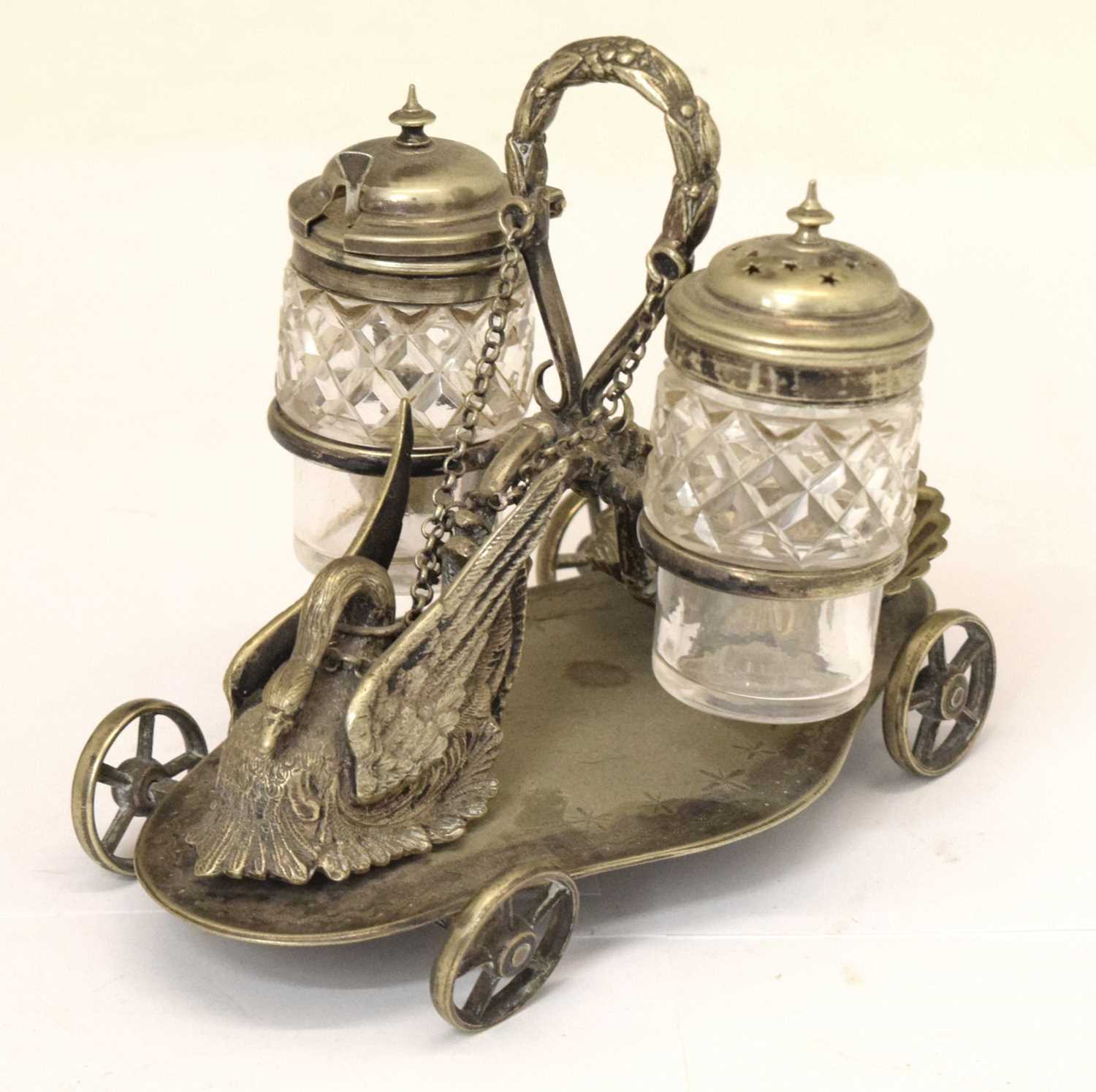 Lot 208 - Victorian silver plated condiment trolley having cast decoration depicting a swan