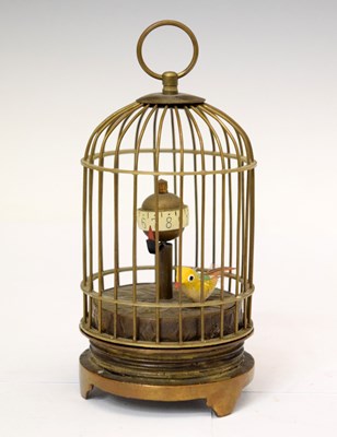 Lot 186 - Mid 20th century novelty brass automaton clock of a bird in a cage