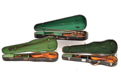 Lot 241 - Three cased violins