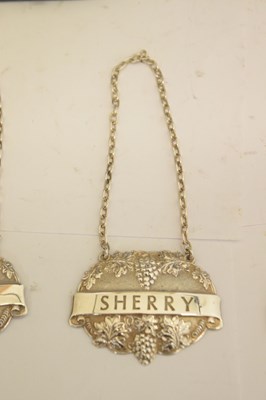 Lot 128 - Two cased sets of silver teaspoons/coffee spoons, and a set of three decanter labels