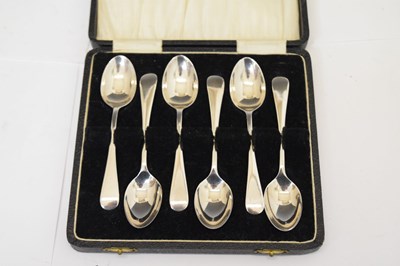 Lot 128 - Two cased sets of silver teaspoons/coffee spoons, and a set of three decanter labels