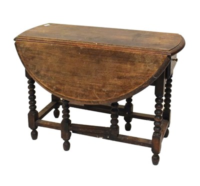 Lot 587 - Miniature oak gateleg table