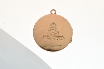 Lot 44 - Royal Artillery 9ct gold circular locket