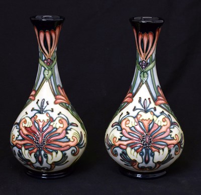 Lot 318 - Moorcroft Pottery - Near pair of 'Florian Dream' pattern vases