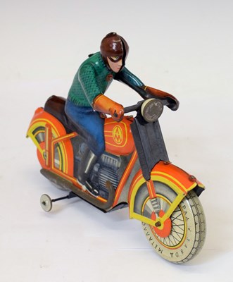 Lot 244 - Soviet-era Metta clockwork tin-plate motorcycle with rider